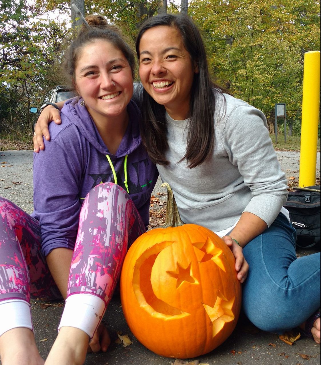 Katie and Yoshie Carving Pumpkins